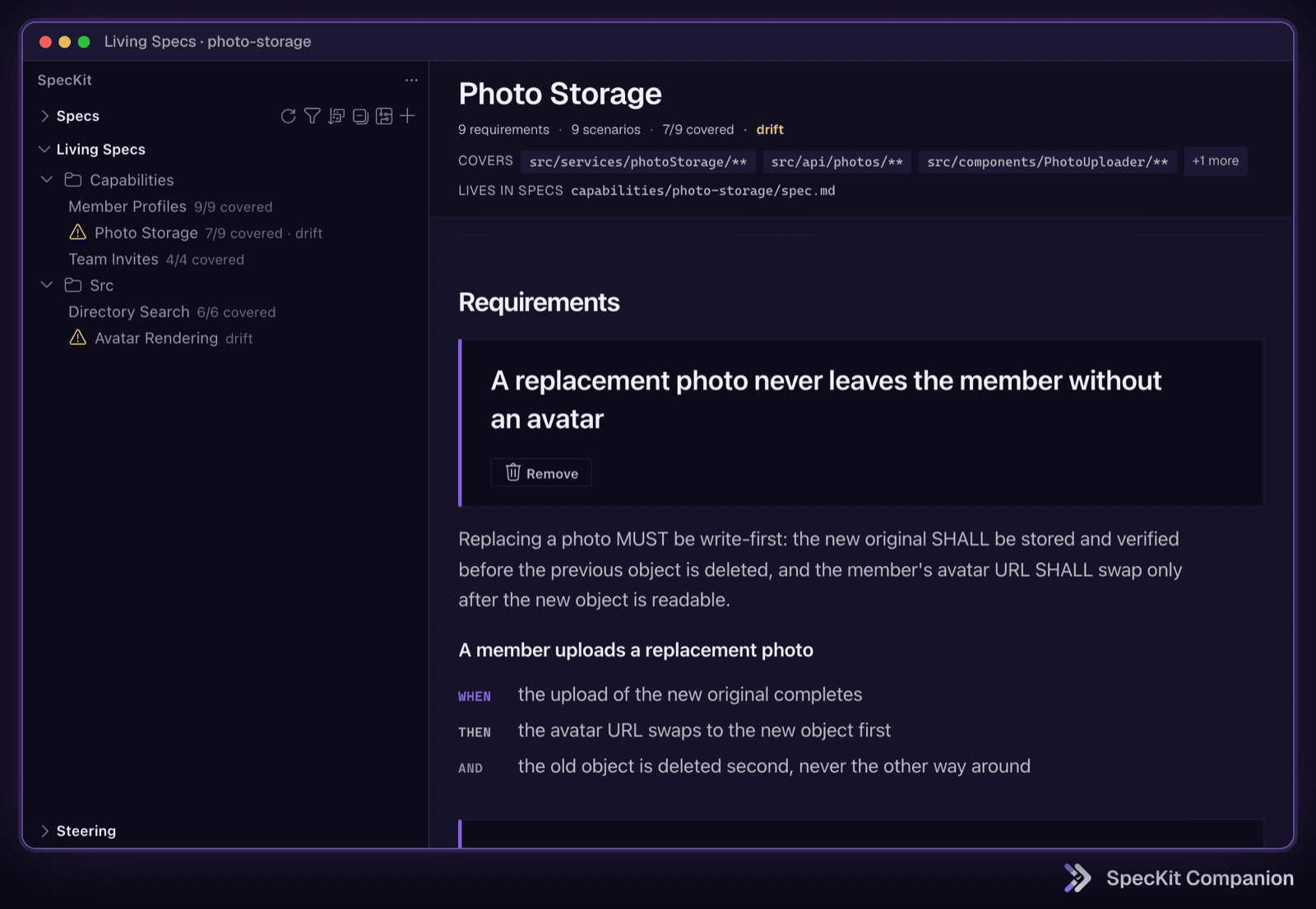 The living specs tree with coverage per capability, and Photo Storage open on its requirements, flagged for drift